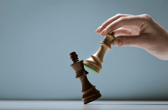 Player defeating his opponent and winning at chess