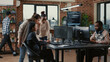 © DC Studio - Mixed team of software engineers brainstorming ideas for new code library in front of computer screens compiling algorithms. Diverse app developers collaborating on group project in it agency office.