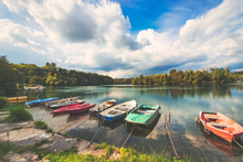 Boats Moored On The River Adda In Trezzo Lombardy Italy