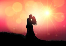 Silhouette Of A Wedding Couple On A Sunset Background