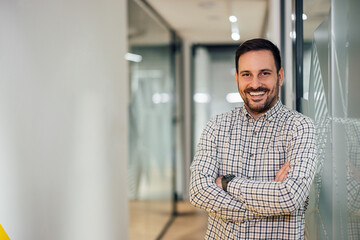 Portrait of smiling caucasian man, starting his own business.