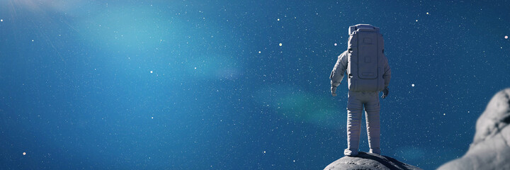 Wall Mural - astronaut looking at the sky, background banner