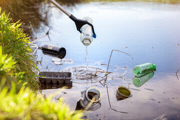 Environmental conservation collecting garbage and trash from water