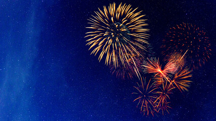 Wall Mural - Fireworks with blur milky way background