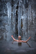 canvas print picture - Mann im kalten Bad der Eishöhle