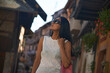 Asian woman enjoying sightseeing in the narrow streets of Paris