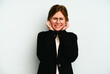 © Asier - Young business English woman isolated on blue background covering ears with hands.