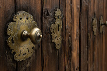 Close-up Of An Antique Golden Door Handle Made Of Metal