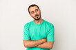 © Asier - Young caucasian man isolated on white background dreaming of achieving goals and purposes