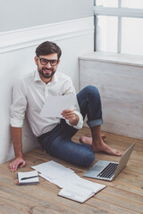 Poster - Handsome businessman with gadget