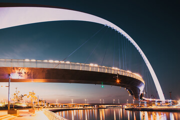 Wall Mural - DUBAI, UAE - FEBRUARY, 2018: Dubai Water Canal arch bridge or Tolerance bridge