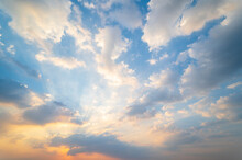 Sunset / Sun Rise Sky With Rays Of  Light Shining Clouds And Sky Background And Texture