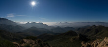 Panorama View Of Semi-desert Mountain Landscape In Southern Spain With A Sun Star