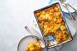 Vegetable gratin with sweet potato, celery, parsnip, carrot, cheese and eggs. Comfort, rustic one casserole food.