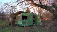Camper Caravan Abandoned And Destroyed By The Passage Of Time - House In A State Of Extreme Poverty In The Countryside For Homeless