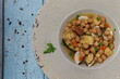 Chickpea stew with monkfish, clams and vegetable