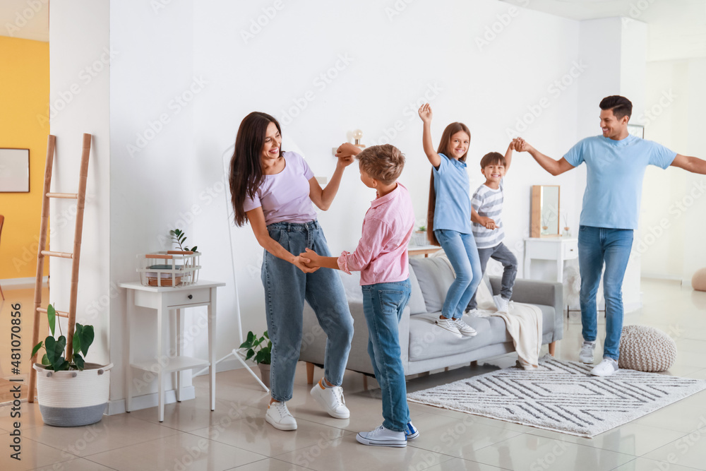 Happy  family dancing at home
