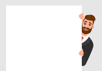 Young trendy businessman standing behind the white blank poster. Hipster person holding empty banner. Male presenting signboard/billboard. Mock up template. Cartoon illustration design in vector style