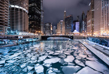 Downtown Cityscape And Frozen Chicago River At Night, Chicago, Illinois, USA