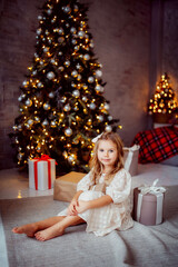 Wall Mural - children, girl, new year, new year's interior, christmas tree, photo shoot in the studio