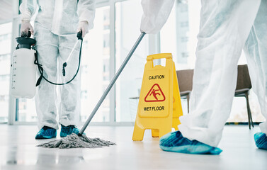 Canvas Print - Decontamination makes a big difference. Shot of healthcare workers wearing hazmat suits and sanitising a room during an outbreak.