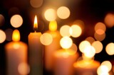 Candlelight Day. Traditional holiday. Group of colored candles lit at night with unfocused lights