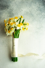 Bouquet Of Narcissus Flowers Tied With A Ribbon