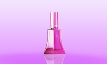 A Bottle Of Perfume. Beautiful Gold Glass Bottle Spray. Modern Luxury Parfum