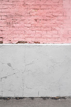 Old Pink Plastered And Painted Brick Wall