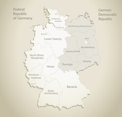  Germany map divided on West and East Germany with regions, and names map, old paper background vector
