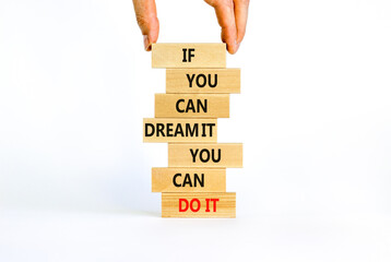 Wall Mural - Dream and do it symbol. Wooden blocks with words If you can dream it you can do it. Beautiful white background, copy space. Businessman hand. Business, motivational dream and do it concept.
