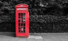 Red Telephone Box. Traditional Iconic Booth Or Kiosk In London, England, United Kingdom.