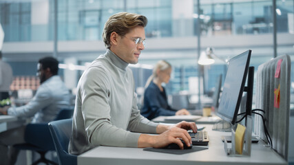 Leinwandbilder - In Big Corporate Office: Portrait of Confident Handsome Manager in Grey Turtleneck Using Computer, Businesspeople and Experts Working Around Him, Analysing Statistics, Commerce Data, Marketing Plans.