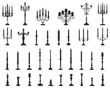 Black Silhouettes Of Candlesticks On A White Background