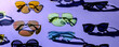 Variety of sunglasses over colorful background	
