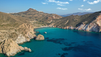 Aerial drone photo of beautiful emerald crystal clear beach and rocky bay of Plathiena, Milos island, Cyclades, Greece