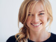 © Anne B/peopleimages.com - Have a good hair day. Portrait of a beautiful young woman.