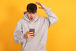 © carballo - isolated teen boy with mobile phone or cell device or smartphone