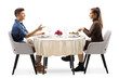 © Ljupco Smokovski - Profile shot of a young man and woman sitting at a restaurant table and talking