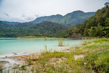 Fototapeta Desenie - The view of the Blue Lake and the natural green Mountains