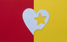 White Heart With Yellow Star On A Yellow And Red Background