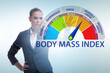 © Elnur - Concept of BMI - body mass index with nutritionist