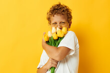 Photo Portrait Curly Little Boy With Yellow Flowers Posing Childhood Fun Isolated Background Unaltered