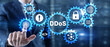 © Funtap - Man clicks on virtual screen with text DDoS Cyber Attack