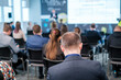© Anton Gvozdikov - Group of entrepreneurs in conference hall