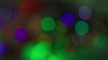 christmas lights, colorful bokeh from the garland on the christmas tree creates a festive atmosphere
