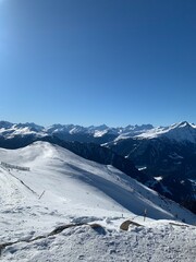 Wall Mural - sunny winter morning on the swiss alps near Lenzerheide in Switzerland