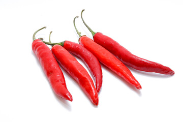 Wall Mural - Big fresh red chilies isolated on white background. Can be used for mixed sauces
