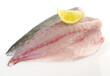 Grey Gilthead - Sea Bream Fillet with Lemon isolated on white Background