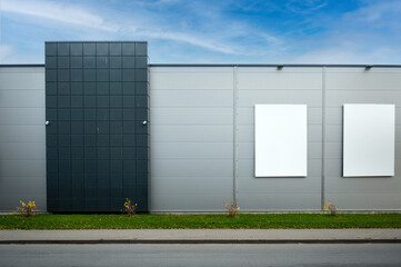 two blank white billboard for advertisement on the wall of commercial building, outdoor advertising